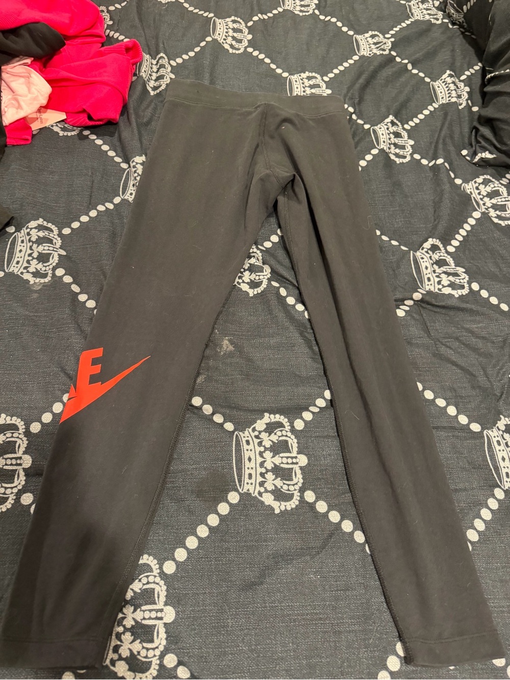 Nike Black Leggings with Red Swoosh Accent